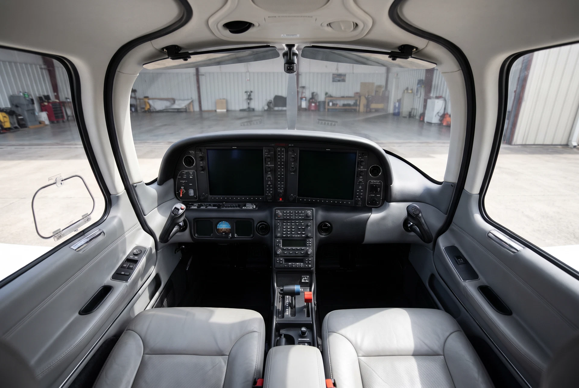 Realistic cleaned student aircraft cockpit with avionics screens powered off